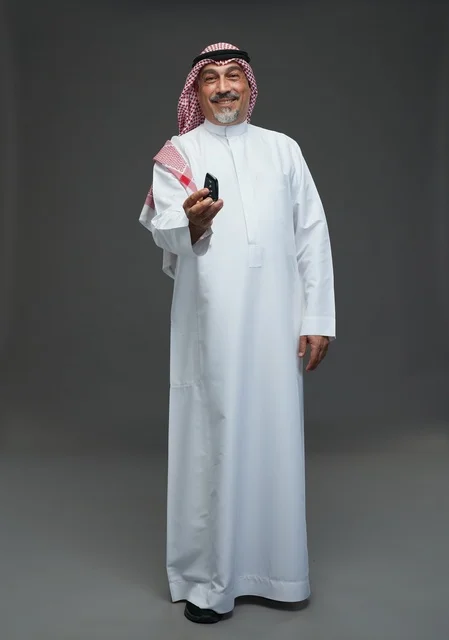 Arab Man Holding Car Key in Studio