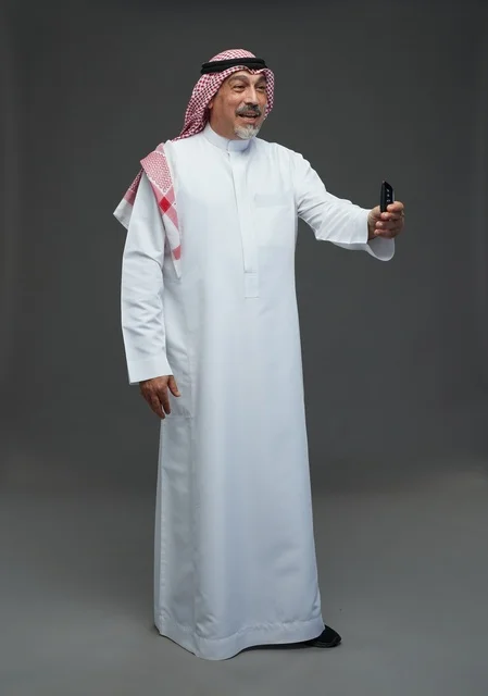 Saudi Man with Car Remote Control in Studio