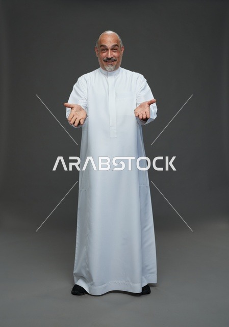 Mature Saudi Man in Thobe Welcoming Gesture