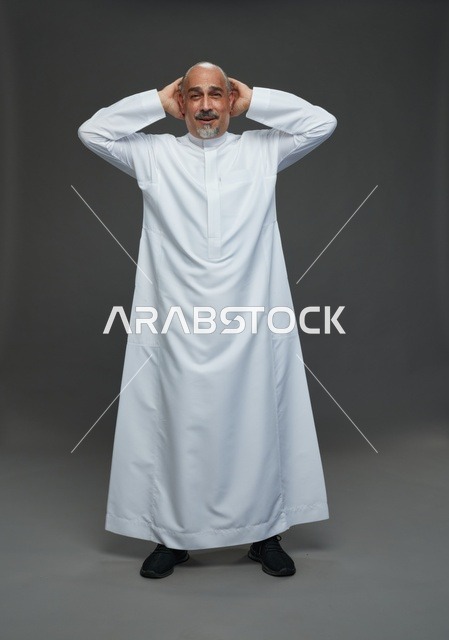 Arab Man in White Thobe Smiling on Grey Background
