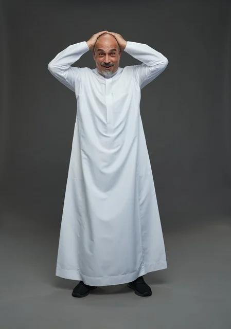Surprised Saudi Man in Traditional White Thobe
