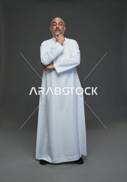 Middle-Aged Arab Man Thinking in White Thobe Portrait