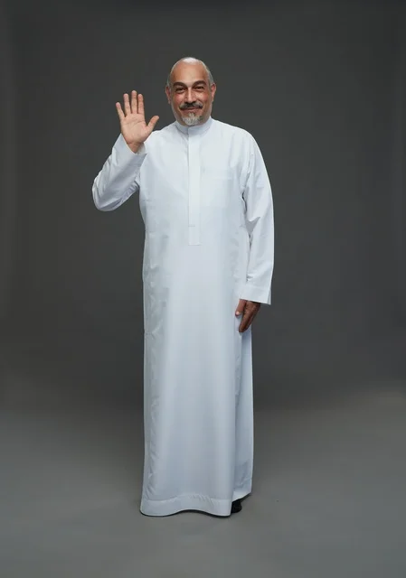 Arab Man in Traditional White Thobe Waving Greeting