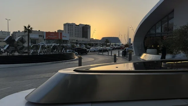 Modern Urban Architecture and City Street at Sunset