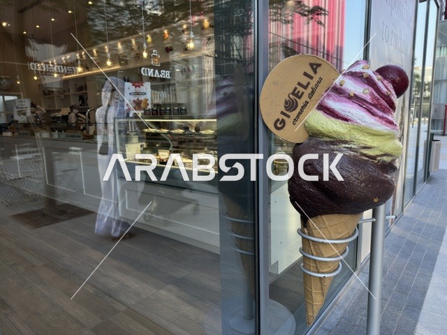 Large Ice Cream Model Outside Modern Dessert Shop