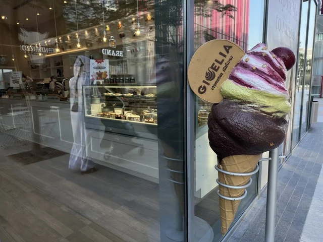 Large Ice Cream Model Outside Modern Dessert Shop