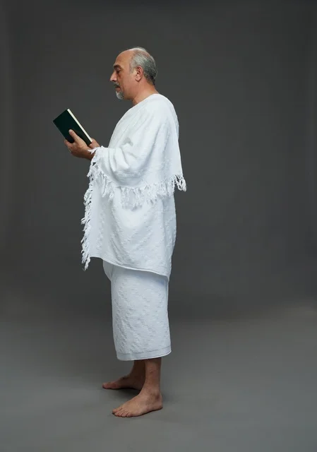 Saudi Man in Ihram Reading Holy Quran Studio Profile