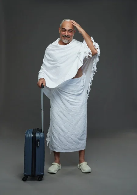 Saudi Man in Ihram with Suitcase for Hajj Umrah Travel