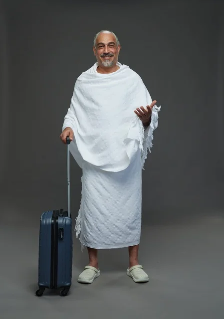 Saudi Man in Ihram with Suitcase for Hajj Pilgrimage