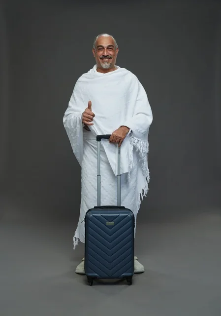 Saudi Man in Ihram with Suitcase for Hajj and Umrah