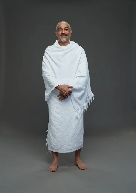 Saudi Man in White Ihram Clothing for Hajj Rituals