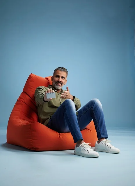 Saudi Man Holding Credit Card in Studio