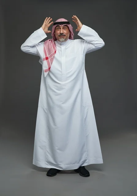 Surprised Saudi Man in Traditional Thobe Studio Portrait