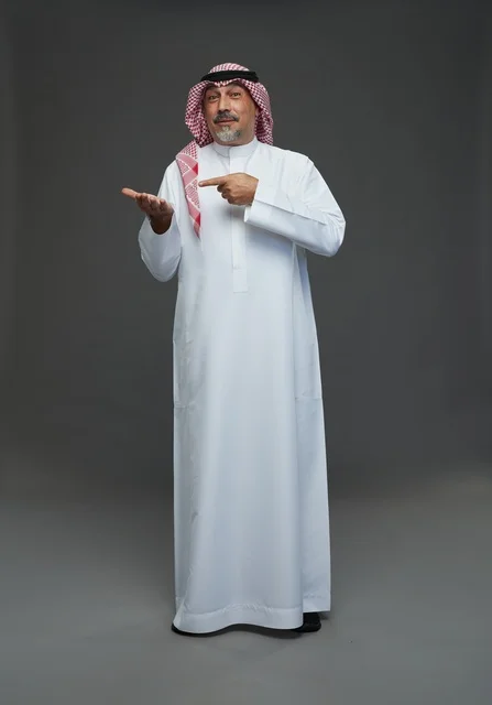 Saudi man in traditional attire with shemagh and agal
