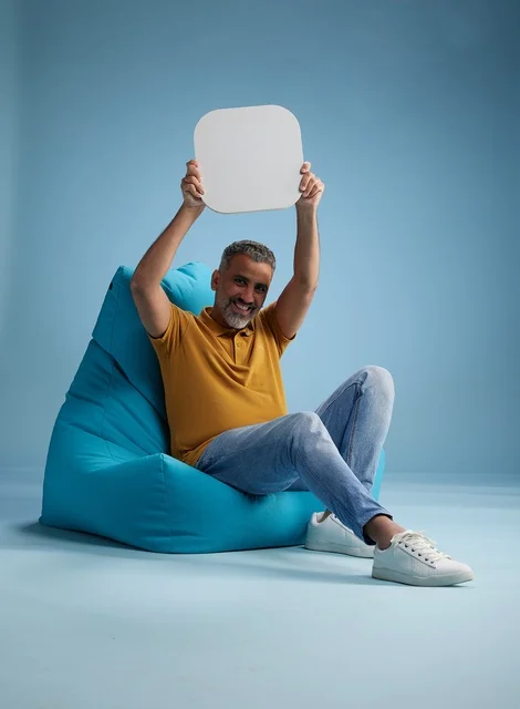Saudi Man Holding Blank Mockup Board in Studio