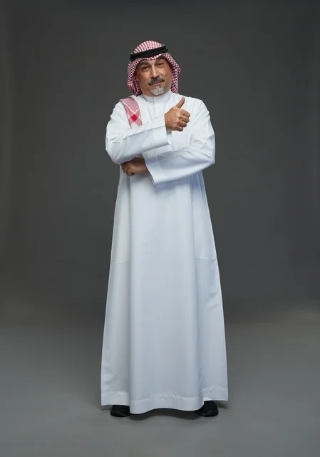 Saudi man in traditional attire with shemagh and agal