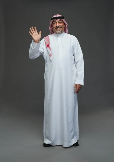 Saudi Man in Traditional Dress Waving Hand Portrait