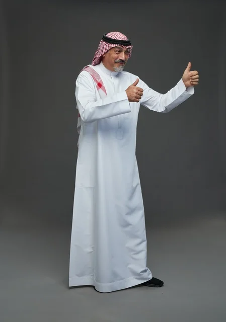 Saudi man in traditional attire with shemagh and agal