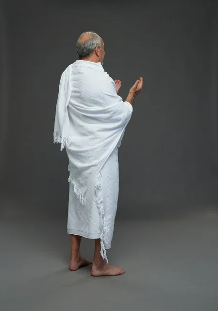 Saudi Man in Ihram Clothes Praying Hajj Umrah Rituals