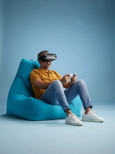 Saudi Man Playing VR Video Games on Bean Bag