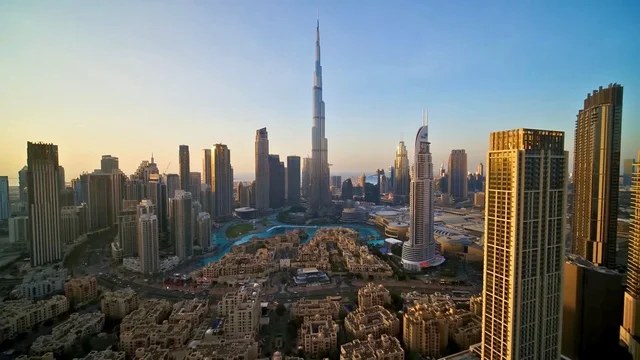 Burj Khalifa and Downtown Dubai Skyline at Sunset