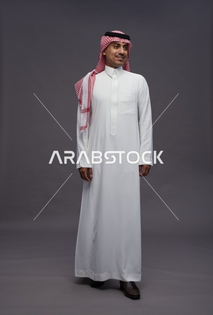 Saudi Man in Traditional Thobe and Shemagh