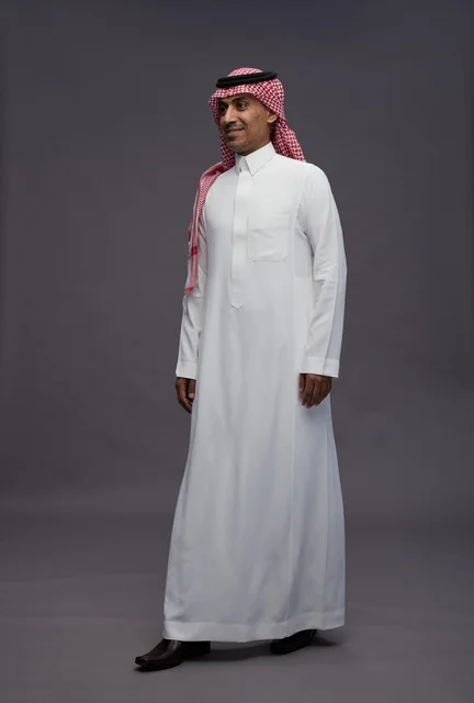 Saudi Man in Traditional Thobe and Shemagh