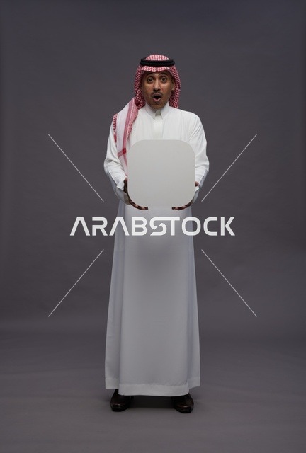 Surprised Saudi Man Holding Blank White Board