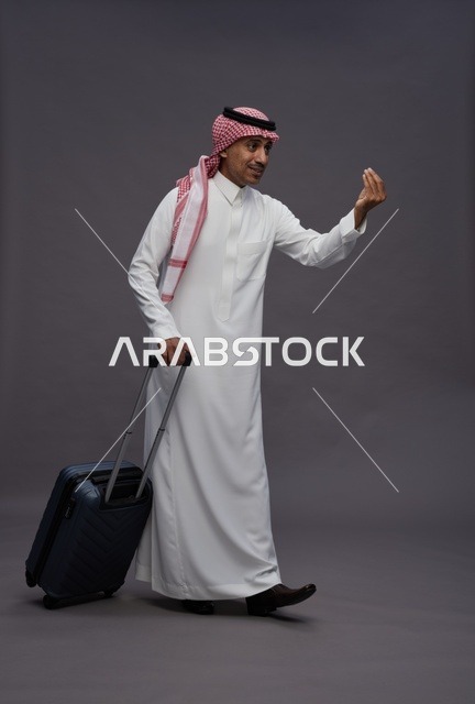 Saudi Man with Suitcase Making Hand Gesture