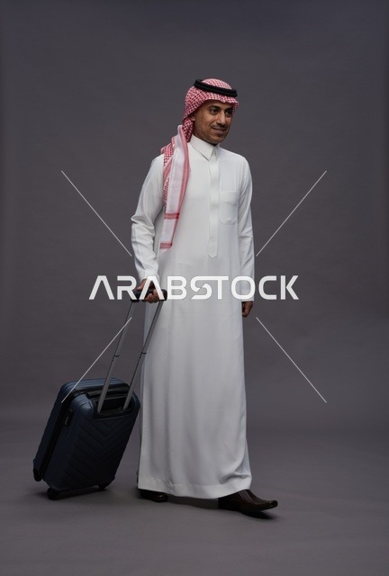Saudi Man in Traditional Thobe with Travel Suitcase