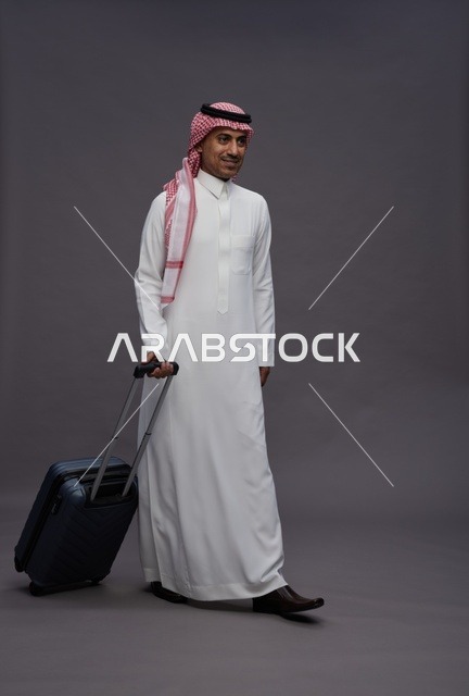 Saudi Man in Traditional Thobe with Travel Suitcase