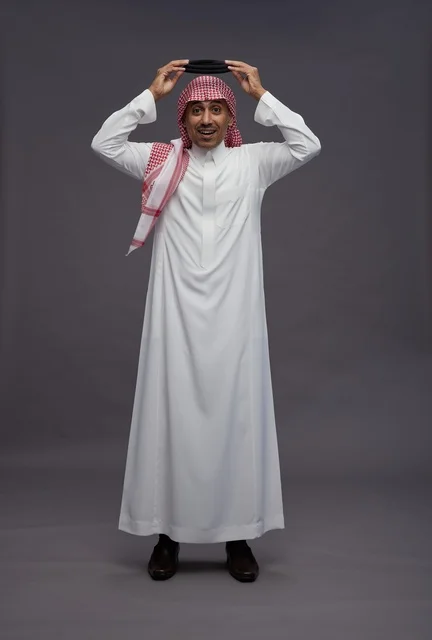 Surprised Saudi Man in Traditional Clothing Studio Portrait