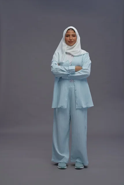Saudi Woman in Modest Casual Outfit Standing in Studio