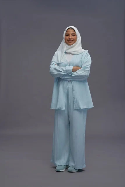 Saudi Woman in Modest Casual Wear Standing in Studio
