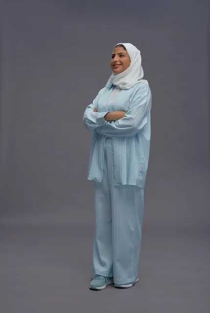 Confident Saudi Woman in Modest Casual Blue Outfit