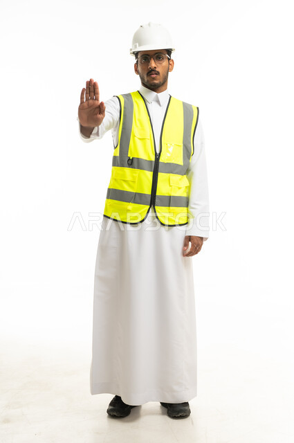 Saudi Engineer in Safety Vest Making Stop Gesture