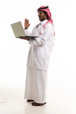 Saudi Male Doctor Using Laptop on White Background