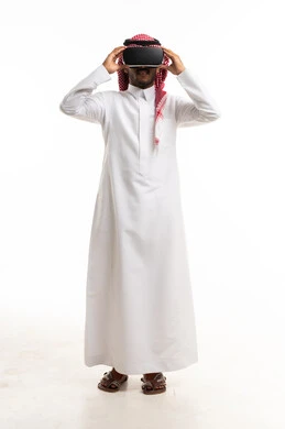 Saudi Man with VR Headset in Traditional Arabic Thobe