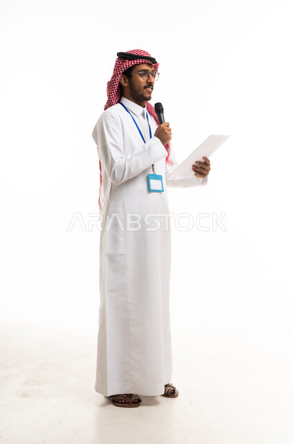 Saudi Man Speaking with Microphone on White Background