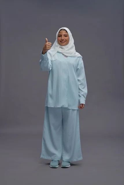 Saudi Woman in Hijab Giving Thumbs Up Gesture