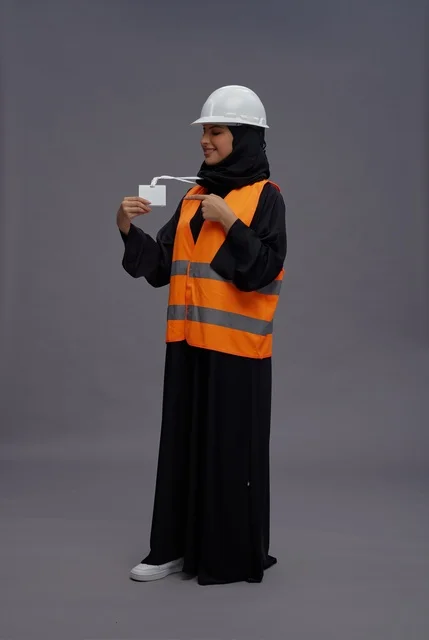 Saudi Female Engineer with Safety Vest and ID Card
