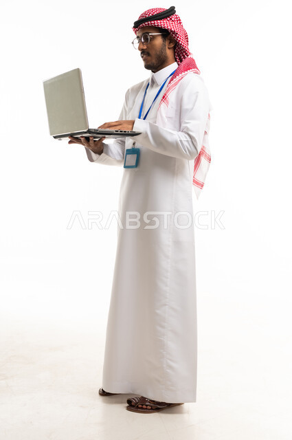 Saudi Businessman Using Laptop on White Background