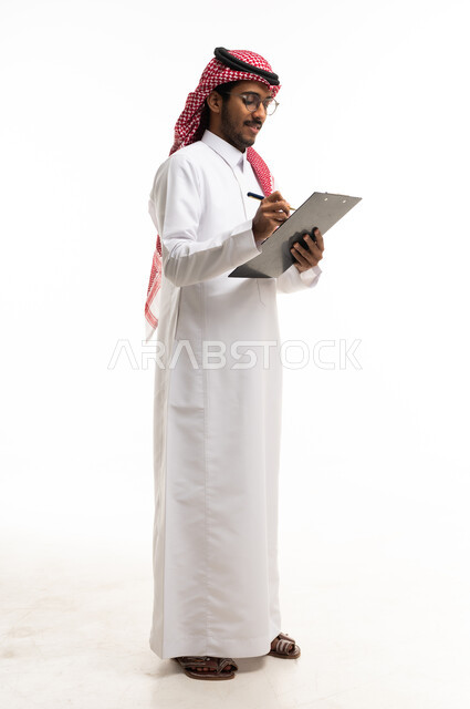 Saudi Man Writing on Clipboard White Background