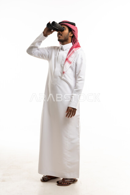 Saudi Man in Thobe Using Binoculars on White Background