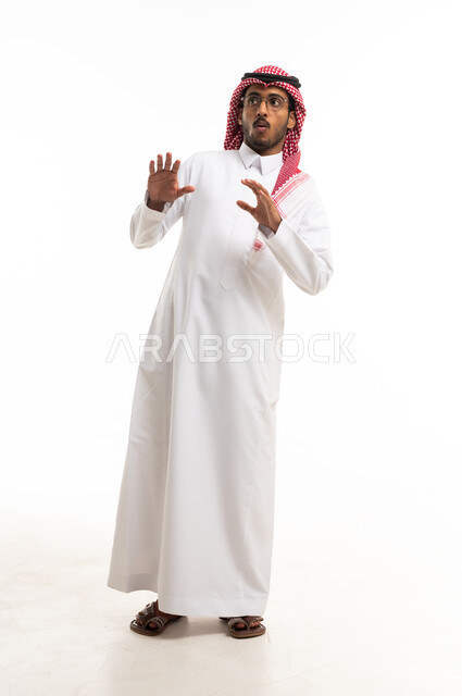 Shocked Saudi Man in Traditional Thobe White Background