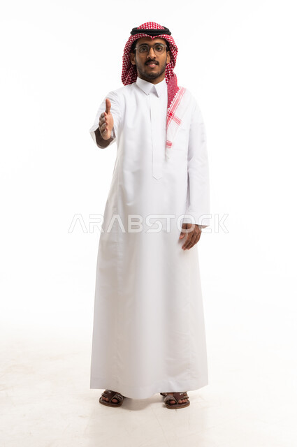 Saudi Man in Traditional Thobe Handshake Gesture