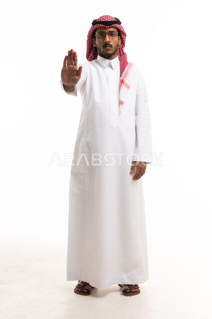 Saudi Man in Thobe Making Stop Hand Gesture