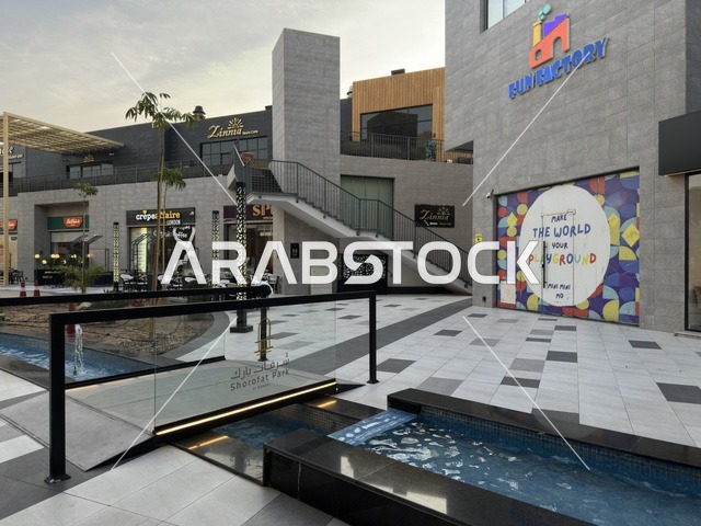 The modern architectural design of the Sharafat Park complex square in Khobar City, Saudi Arabia.