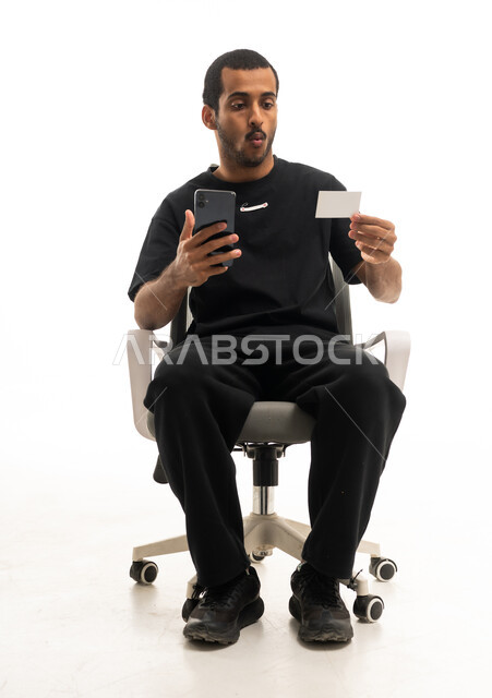 Arab Man with Smartphone and Card on White Background