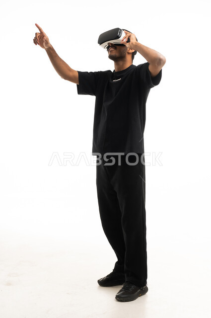 Arab Man Using VR Headset on White Background